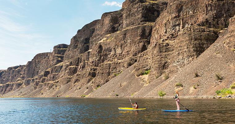 Crescent Bar Recreation area - person paddleboarding and kayaking
